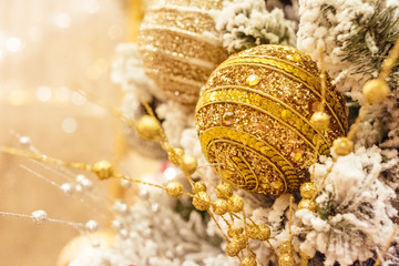 yellow Christmas ball on the tree