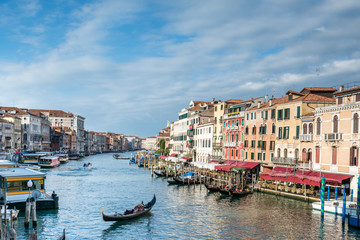 View of the Grand Canal with gondolas from Rialto Bridge. Venice, Italy.
