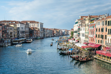 Fototapeta na wymiar View of the Grand Canal with gondolas from Rialto Bridge. Venice, Italy.