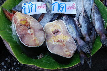 Pressed fish, giant catfish, sliced in the rural market.  (English translation : Bagridae and ...