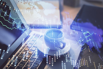 Forex market chart hologram and personal computer background. Double exposure. Concept of investment.