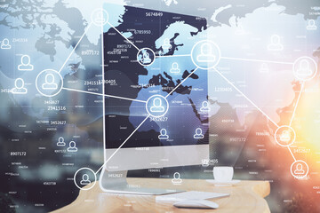 Computer on desktop with social network theme icon. Multi exposure. Concept of international connections.