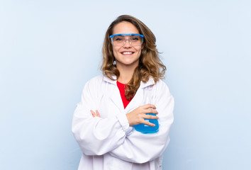 Young blonde woman with a scientific test tube