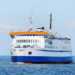 Ferry sailing in the bright sunny day