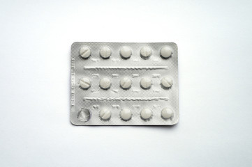 Top view of tablets in blister pack isolated on white background