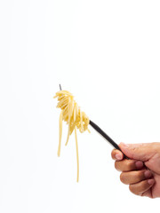 hand holding fork handle roll spaghetti line