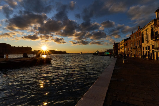sunset over giudecca island seen from fondamenta zattere al ponte largo