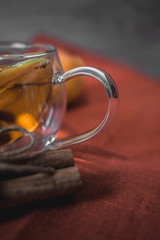 Apple Cider Drink, Juice, Punch, Tea with Spices, Cinnamon sticks, star anise and fresh Apples on a wooden background. Hot drink for Autumn and Winter evenings. Close up. Seasonal mulled drink.