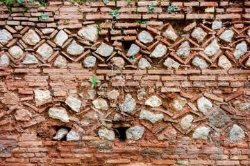 The ruin of an ancient brick-stone patterned Delphi Wall, Greecel