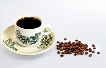 cup of coffee with beans
