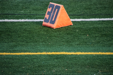 30 yard line marker on American football field