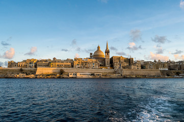 Panoramic view of Valletta Skyline at beautiful sunset from Sliema