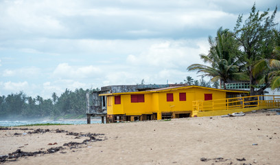 Yellow house on the beach