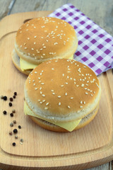 beef burger on a cutting board