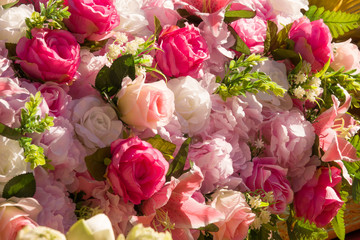 Artificial pink flower background