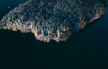 Aerial View of Boreal Forest Nature and lake in Winter Season, Helsinki, Finland