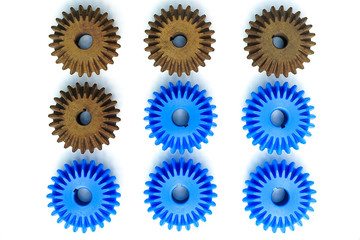 Bevel Gears in brown with many blue on a white background Leadership, identity, initiative, strategy, conflict, different ideas, business success concepts