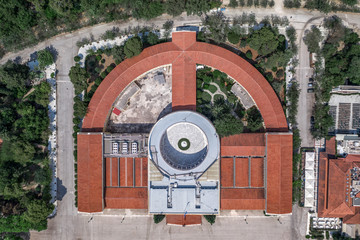 Overhead aerial drone shot of Zappeion Hall in national garden of Athens