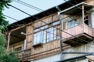 Traditional wooden balconies of residential building in center of Tbilisi