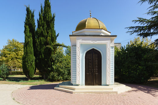 Blue and white Muslim Durbe with a Golden dome in Marshal Sokolov square in Yevpatoria, Crimea