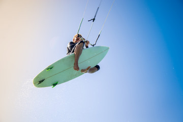The kite surfer rides the waves of the Atlantic Ocean