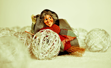 the Befana arrives on her flying broom