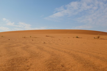 Fototapeta na wymiar Desert sand and blue sky in Riyadh, Saudi Arabia