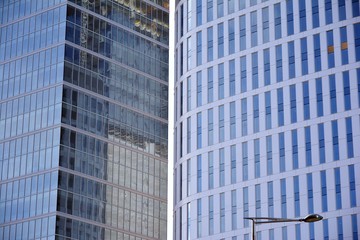 Abstract texture of blue glass modern building skyscrapers. Business background.