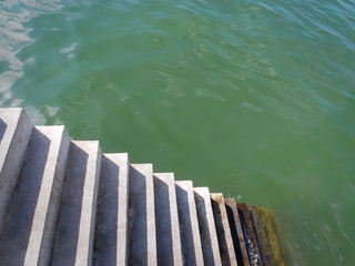 High Angle View of Concrete Staircase Over Sea Surface