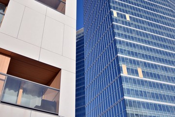 Obraz premium Fragment of modern residential apartment with flat buildings exterior. Detail of new luxury house and home complex. 