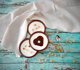 Italian dessert panna cotta with hazelnuts and caramel