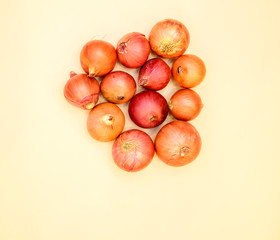 Red onions isolated on egg shell white background