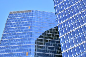 Abstract texture of blue glass modern building skyscrapers. Business background.