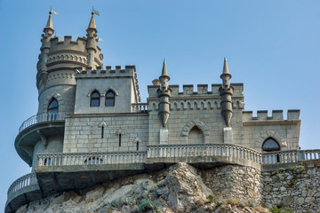 Fototapeta na wymiar Yalta, Crimea - July 29, 2016: castle on a protruding rock in the Black Sea