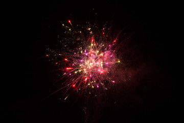 Red Firework isolated on black background