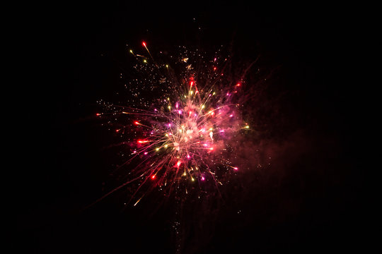 Red Firework isolated on black background