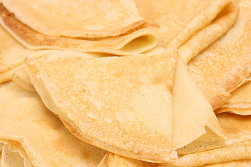 Background of homemade golden pancakes