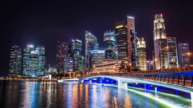 Singapore financial and business district in downtown core time lapse at night