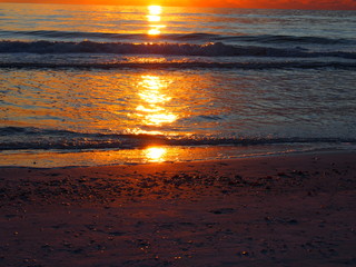 Beautiful Gulf of Mexico Sunset with Sun Reflecting in the Water