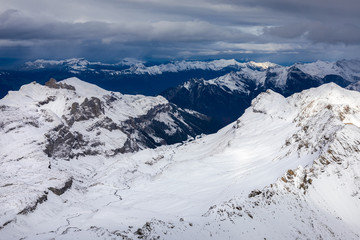 Fototapeta na wymiar Mountains around Shilthorn covered by snow.