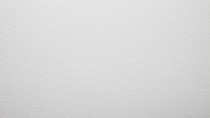 White concrete wall.Water-based paint background.The texture of the white painted walls.