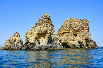 Fototapeta na wymiar Ponta da Piedade - Bizarre cliffs and grottoes, Lagos Portugal.