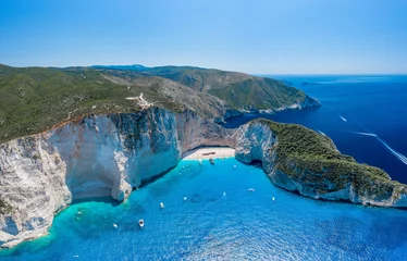 Door stickers Navagio Beach,  Zakynthos, Greece Aerial panorama drone shot of Zakynthos north end with Navagio beach and yachts in Ionian sea