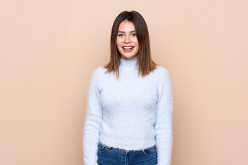 Obraz premium Young woman over isolated background with surprise facial expression