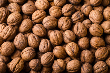 Whole Walnuts background, food concept. Top view