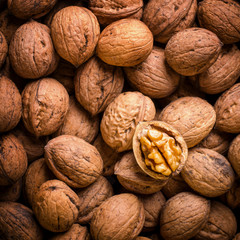 Whole Walnuts background, food concept. Top view