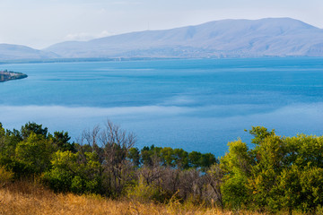Fototapeta na wymiar Beautiful view of Lake Sevan and surrounding mountains , Armenia