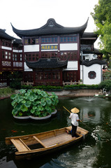 A boatman in Yu Garden, Shanghai, China