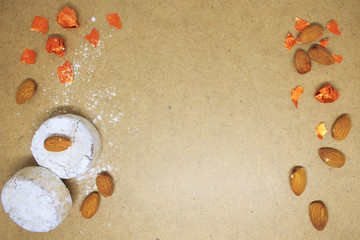 Background. Almond mantecado, polvoron on a background of brown paper