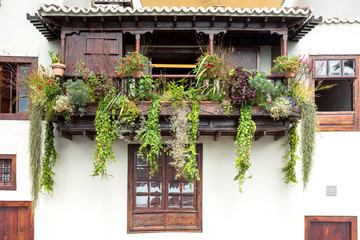 Fototapeta na wymiar Medieval wooden balcony of Santa Cruz